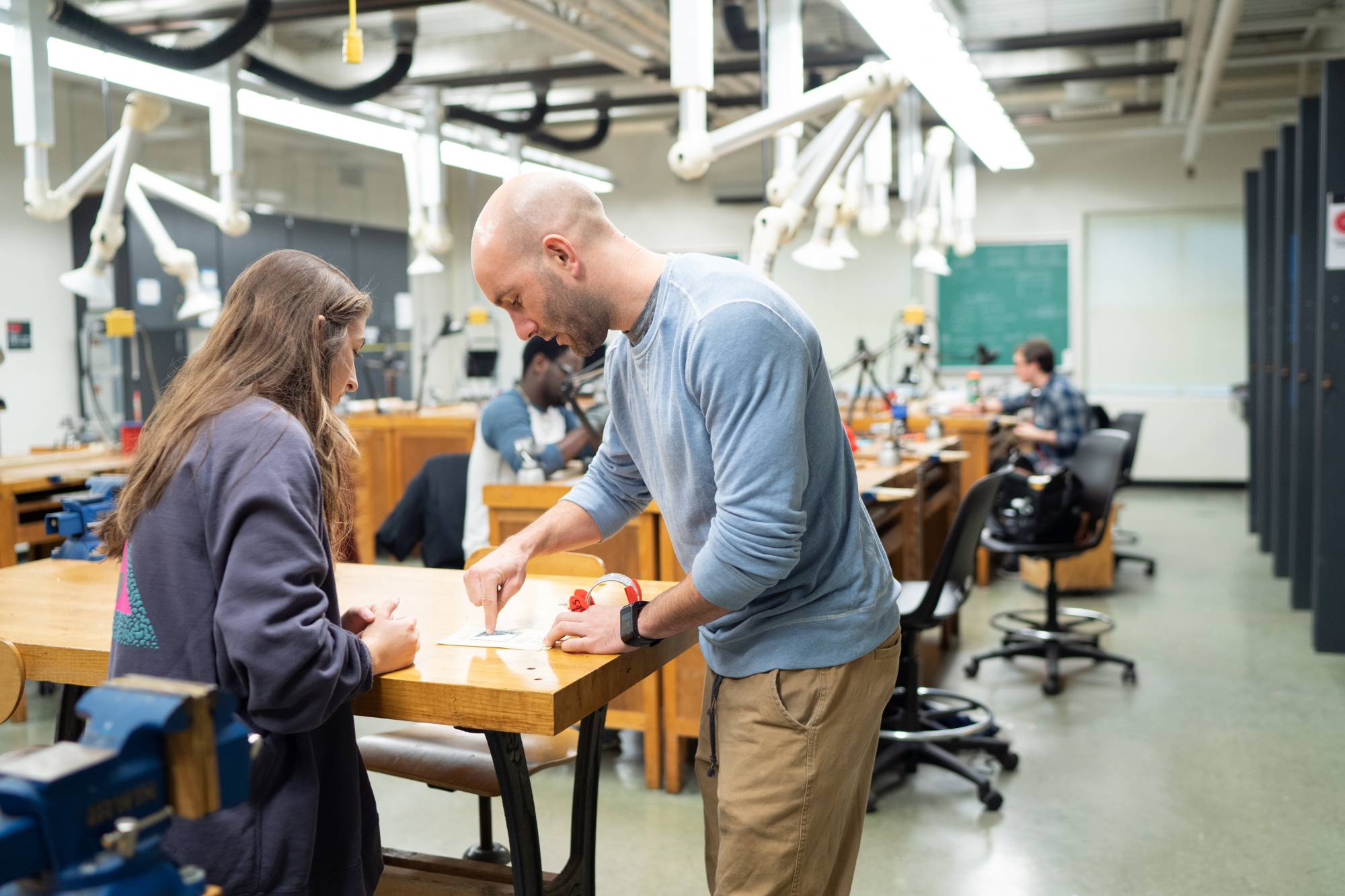 Professor helping a student